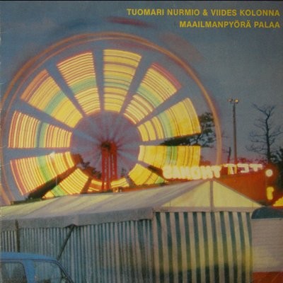 Tuomari Nurmio & Viides Kolona : Maailmanpyörä Palaa (LP)